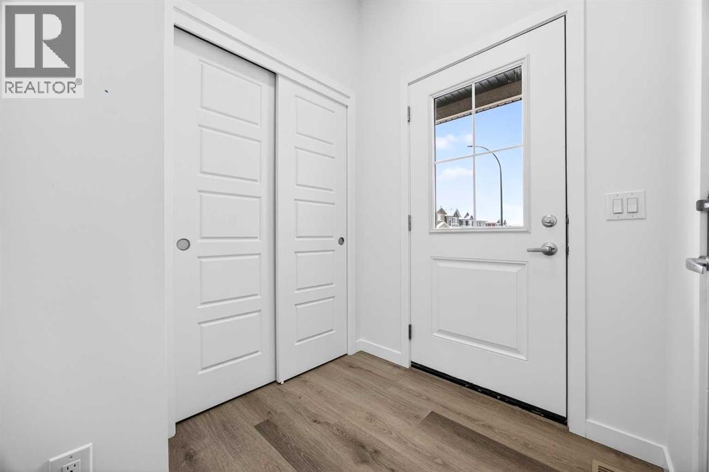 58 Creekside Way Sw, Calgary, Alberta  T2X 6E2 - Photo 2 - A2292907