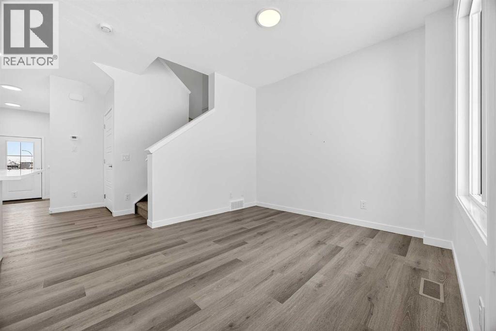 58 Creekside Way Sw, Calgary, Alberta  T2X 6E2 - Photo 6 - A2292907