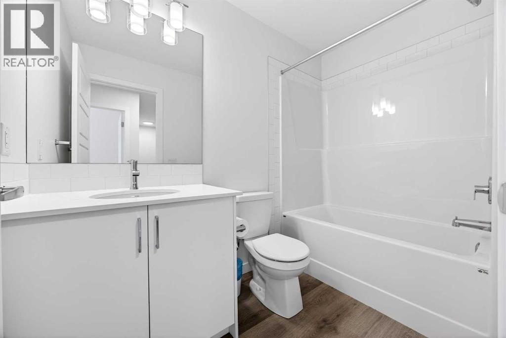 58 Creekside Way Sw, Calgary, Alberta  T2X 6E2 - Photo 25 - A2292907