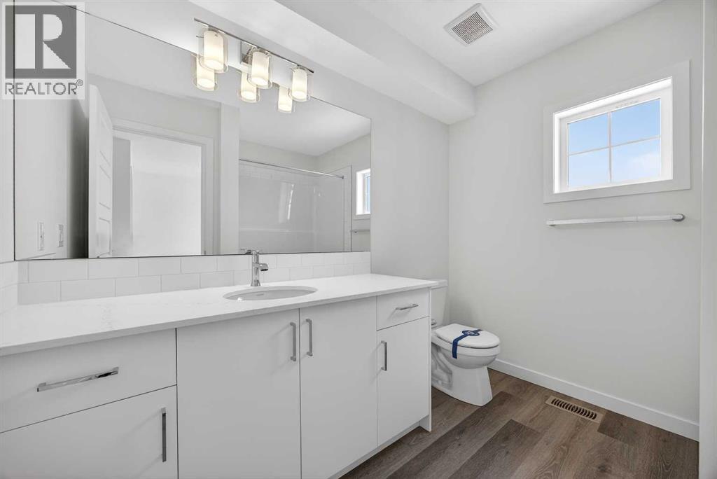 58 Creekside Way Sw, Calgary, Alberta  T2X 6E2 - Photo 21 - A2292907