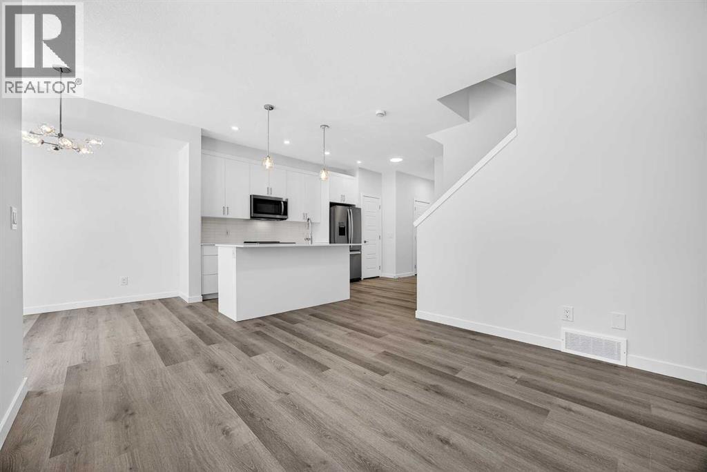 58 Creekside Way Sw, Calgary, Alberta  T2X 6E2 - Photo 5 - A2292907