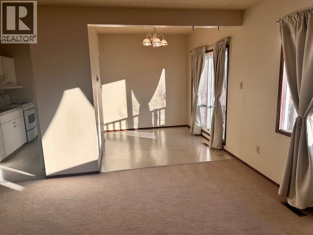 447 Huntsville Crescent Nw, Calgary, Alberta  T3K 4W3 - Photo 30 - A2293800