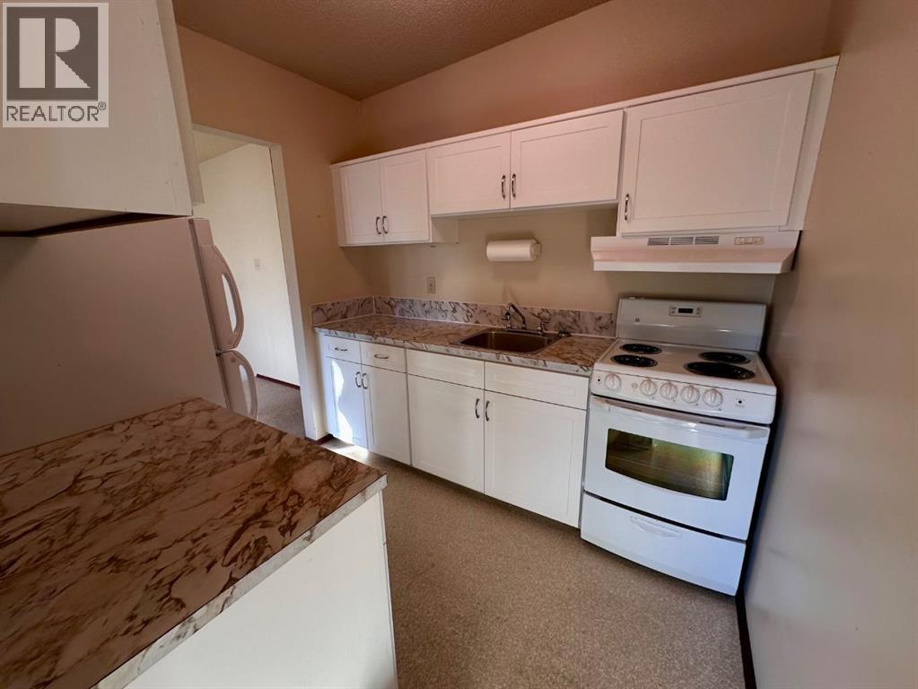 447 Huntsville Crescent Nw, Calgary, Alberta  T3K 4W3 - Photo 24 - A2293800