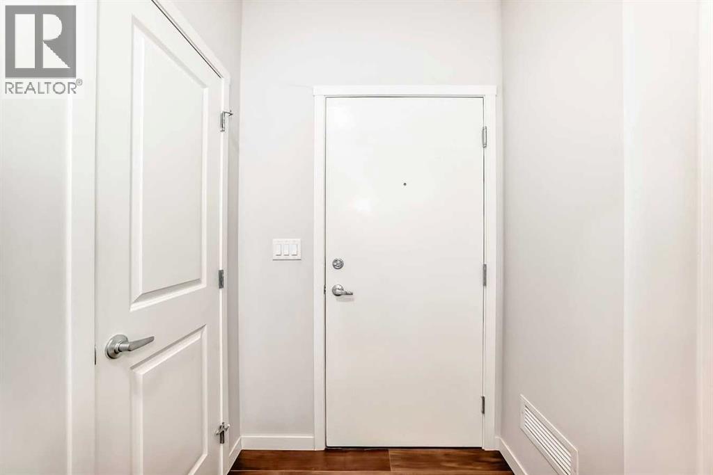 104, 360 Harvest Hills Common NE, Calgary, Alberta  T3K 2N1 - Photo 4 - A2283549