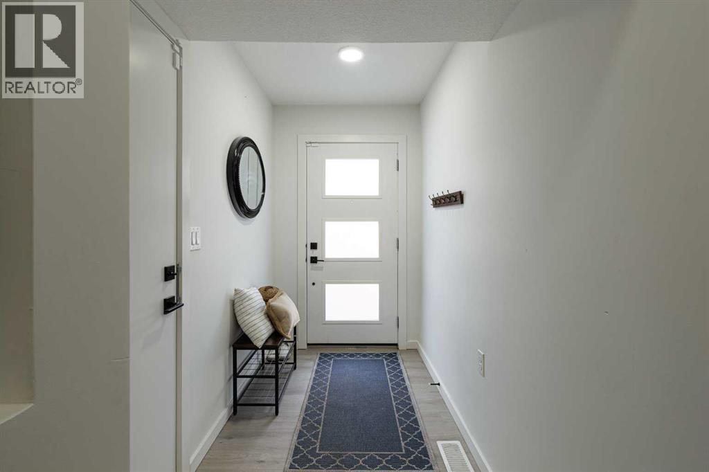 74 Spring Willow Close Sw, Calgary, Alberta  T3H 6E8 - Photo 6 - A2290281