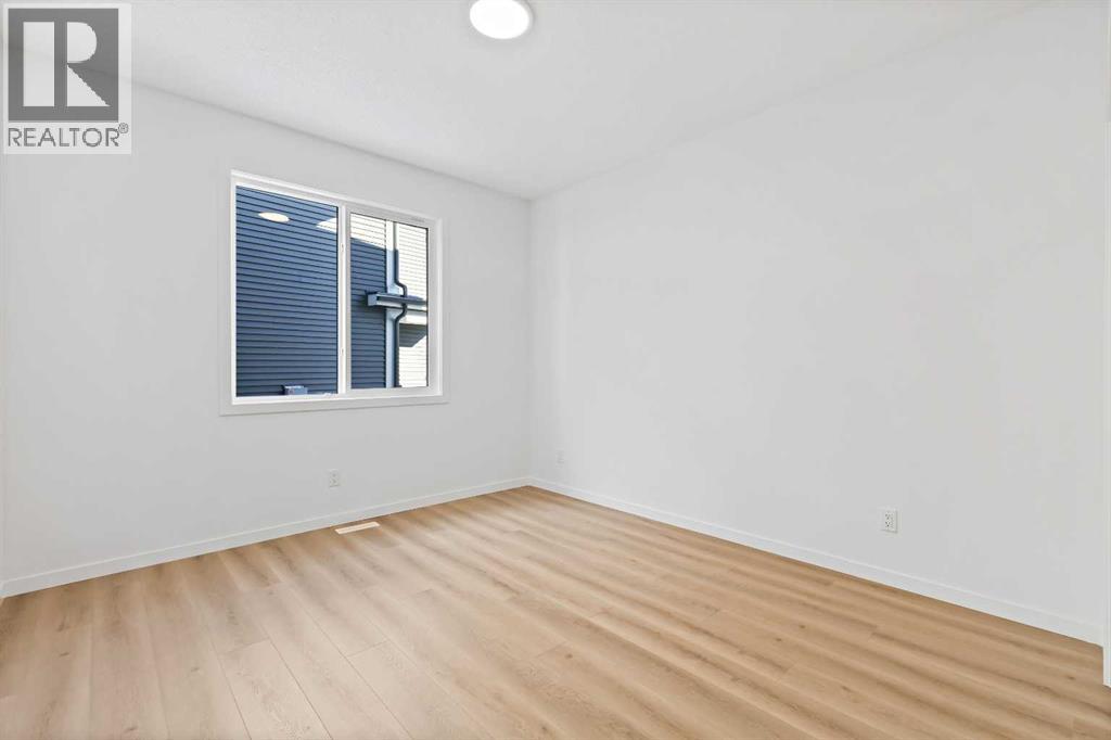 405 Corner Glen Way NE, Calgary, Alberta  T3N 2P1 - Photo 9 - A2273861