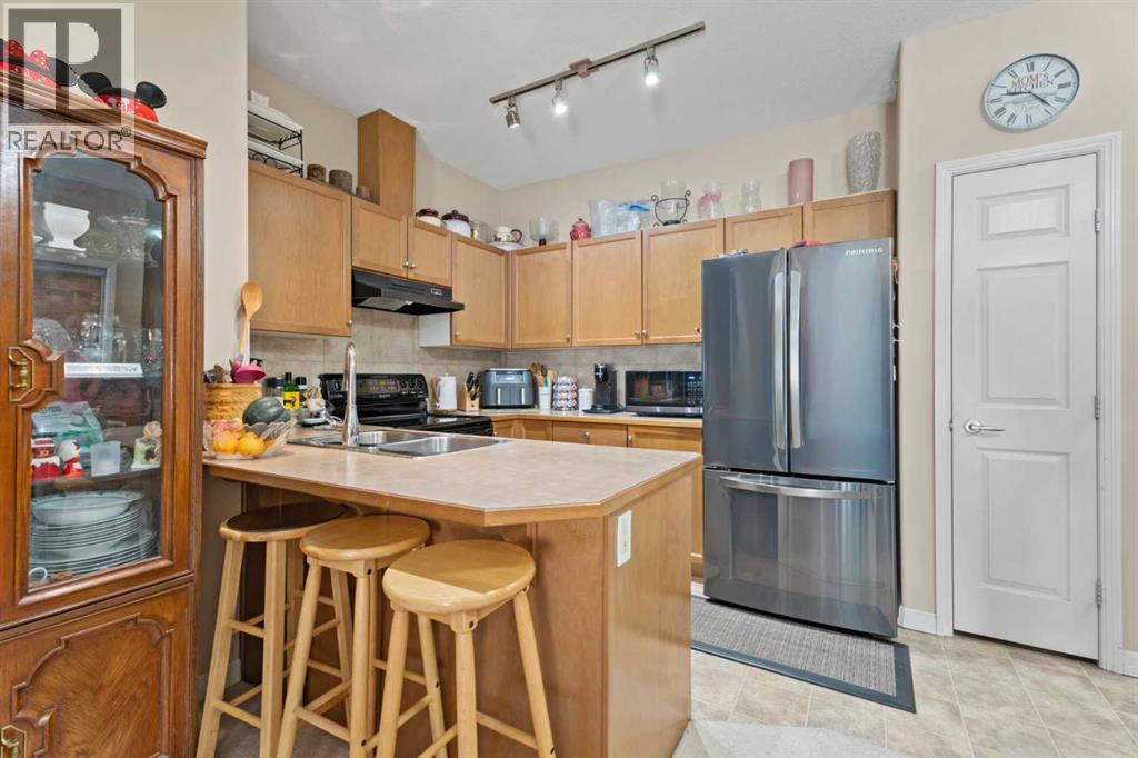 3403, 92 Crystal Shores Road, Okotoks, Alberta  T1S 2N1 - Photo 4 - A2293466