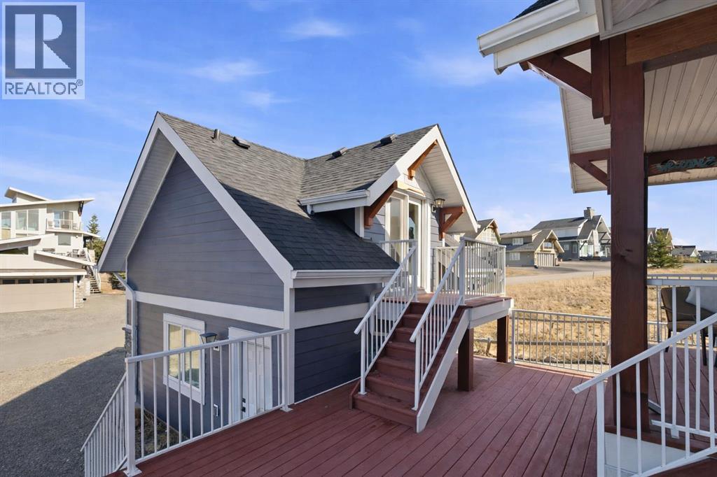 419 Cottageclub Cove, Rural Rocky View County, Alberta  T4C 1B4 - Photo 32 - A2294510