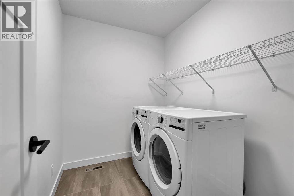 1357 South Point Parade SW, Airdrie, Alberta  T4B 5P3 - Photo 43 - A2296206