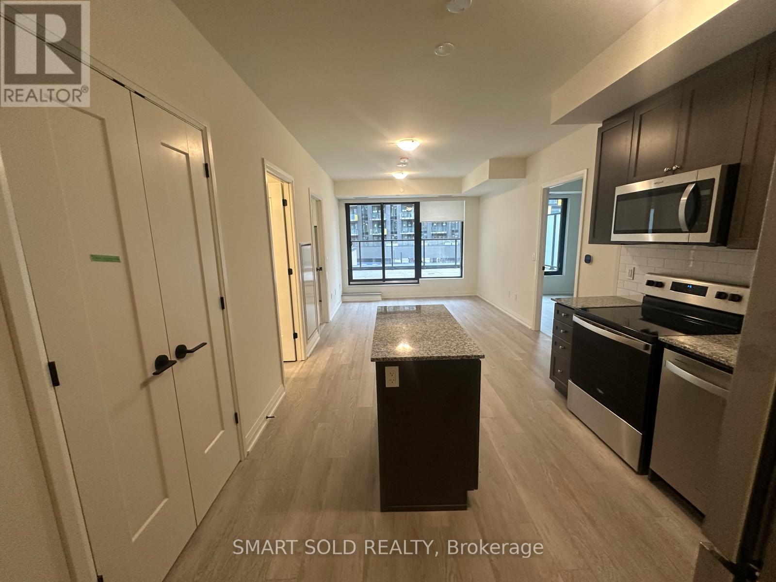 202 - 1415 Dundas Street E, Oakville, Ontario  L6H 7V8 - Photo 4 - W12926520