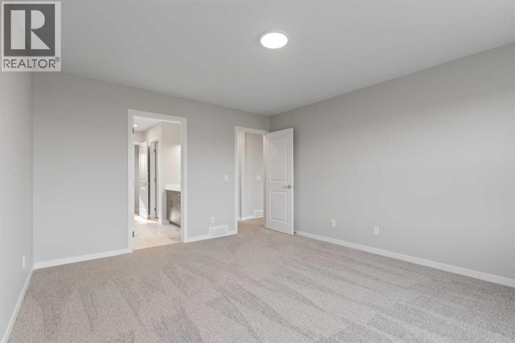 106 Monterey Bay SE, High River, Alberta  T1V 0K3 - Photo 21 - A2267748