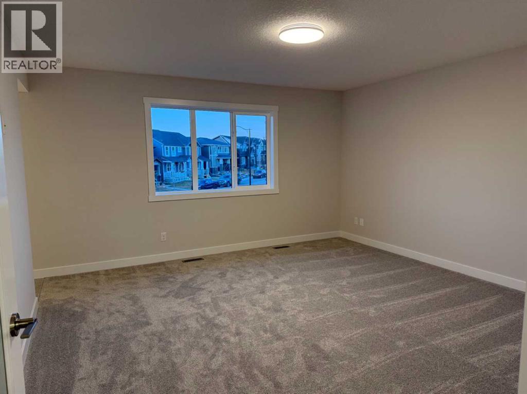 51 Sunrise Heath, Cochrane, Alberta  T4C 3C5 - Photo 36 - A2256885