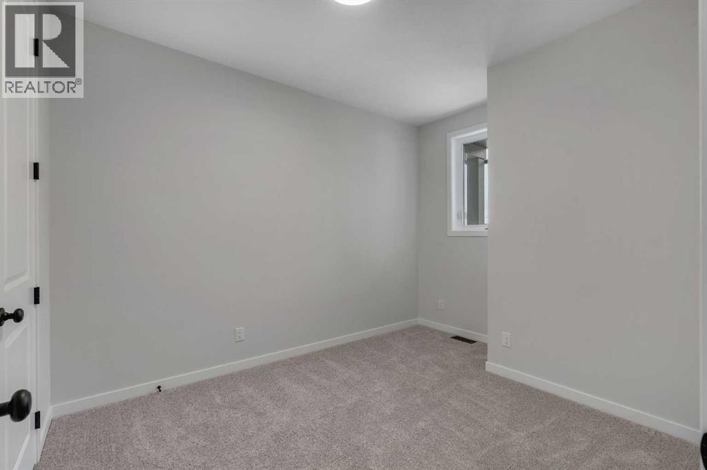 108 Creekview Manor Sw, Calgary, Alberta  T2X 4Y1 - Photo 15 - A2271874