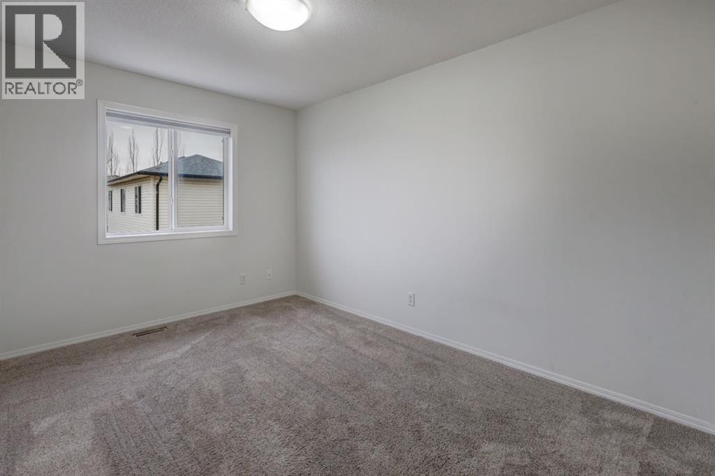 233 Luxstone Road SW, Airdrie, Alberta  T4B 0K5 - Photo 19 - A2296582