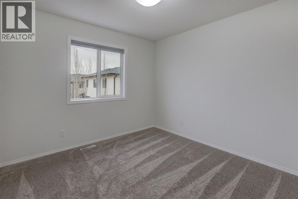 233 Luxstone Road SW, Airdrie, Alberta  T4B 0K5 - Photo 18 - A2296582