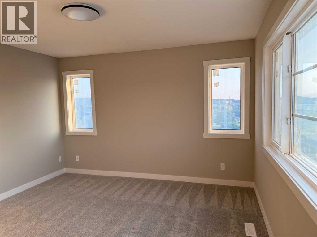 302 Sundown Road, Cochrane, Alberta  T4C 3H2 - Photo 23 - A2256036