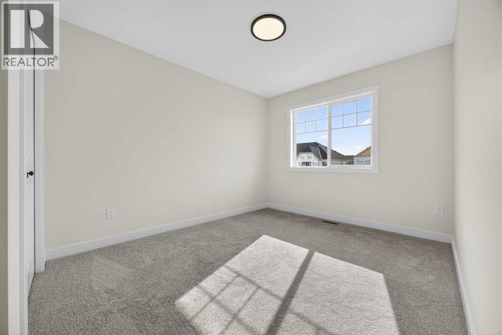 1086 Bayview Crescent Sw, Airdrie, Alberta  T4B 4G2 - Photo 39 - A2293567