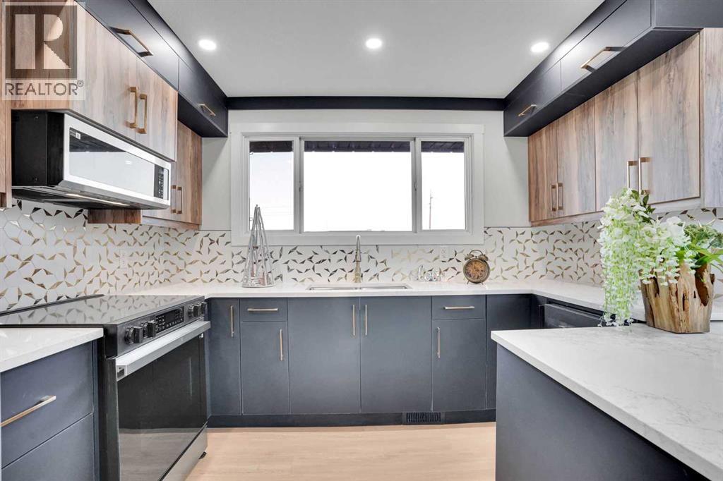 12112 Canfield Road Sw, Calgary, Alberta  T2W 1V2 - Photo 12 - A2295382