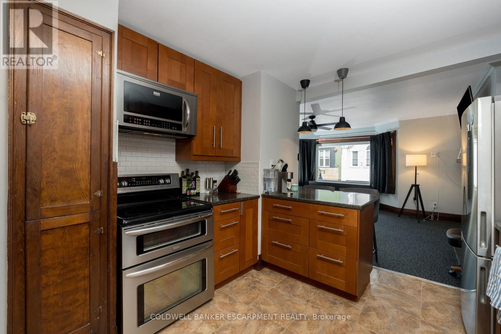 A - 20 Mill Street E, Halton Hills, Ontario L7J 1G9 - Photo 2 - W12926970