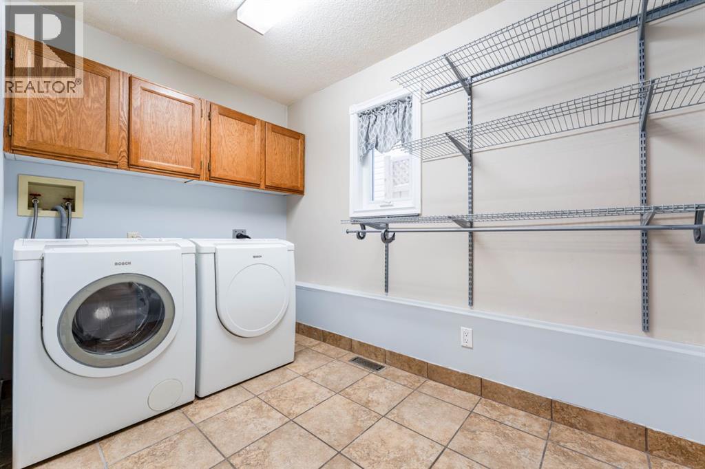 215 Scenic Way NW, Calgary, Alberta  T3L 1B6 - Photo 24 - A2294245