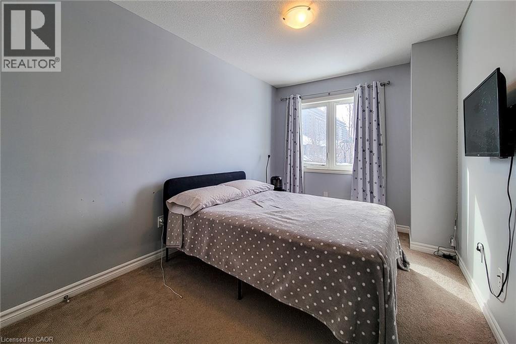 91 Poppy Drive E Unit# 48, Guelph, Ontario  N1L 0M6 - Photo 26 - 40801903