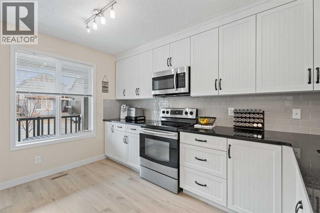 216 Copperpond Parade Se, Calgary, Alberta  T2Z 5B2 - Photo 5 - A2296365