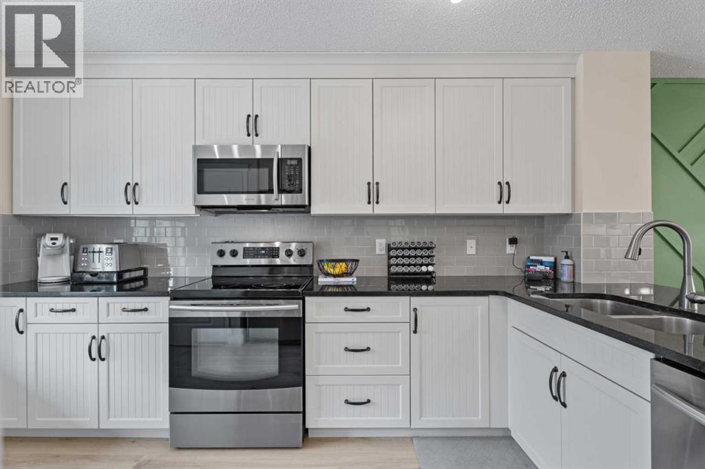 216 Copperpond Parade Se, Calgary, Alberta  T2Z 5B2 - Photo 3 - A2296365