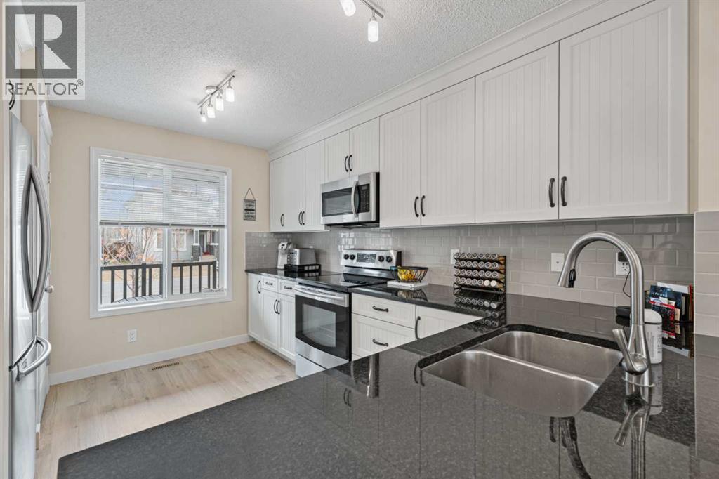 216 Copperpond Parade Se, Calgary, Alberta  T2Z 5B2 - Photo 4 - A2296365