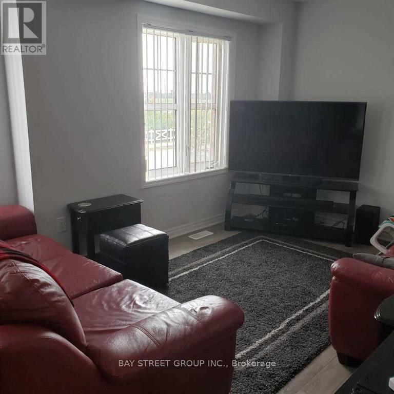 1574 Farmstead Drive, Milton, Ontario  L9E 0A4 - Photo 4 - W12927166