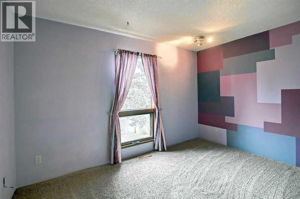 3 Berwick Crescent Nw, Calgary, Alberta  T3K 1P7 - Photo 17 - A2291794