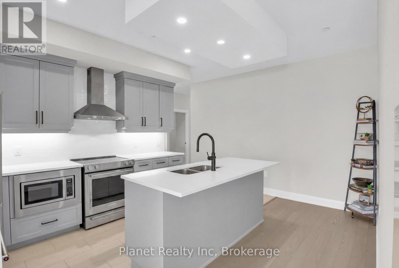 712 - 71 Wyndham Street S, Guelph (St. Patrick's Ward), Ontario  N1E 5R3 - Photo 8 - X12927338