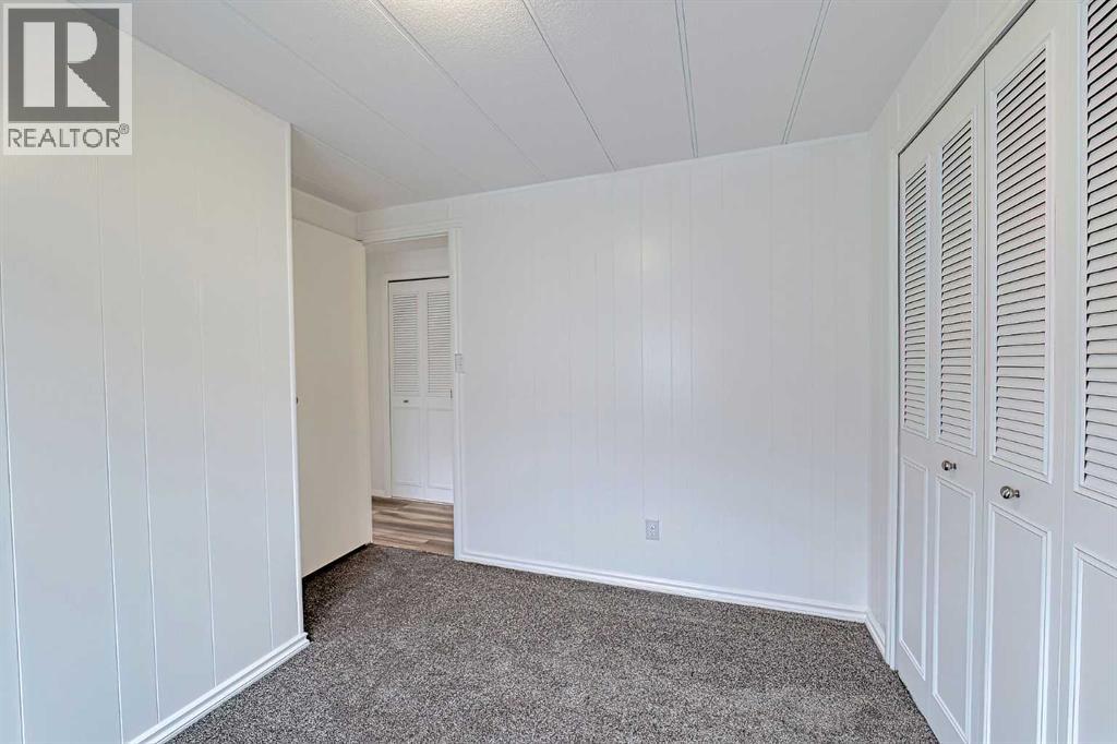 303, 99 Arbour Lake Road NW, Calgary, Alberta  T3G 4E4 - Photo 32 - A2296648