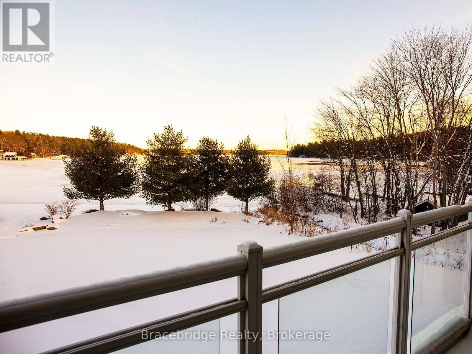 G102-C2 - 1869 Muskoka Road 118 Highway W, Muskoka Lakes (Monck (Muskoka Lakes)), Ontario  P1L 1W8 - Photo 2 - X12927424