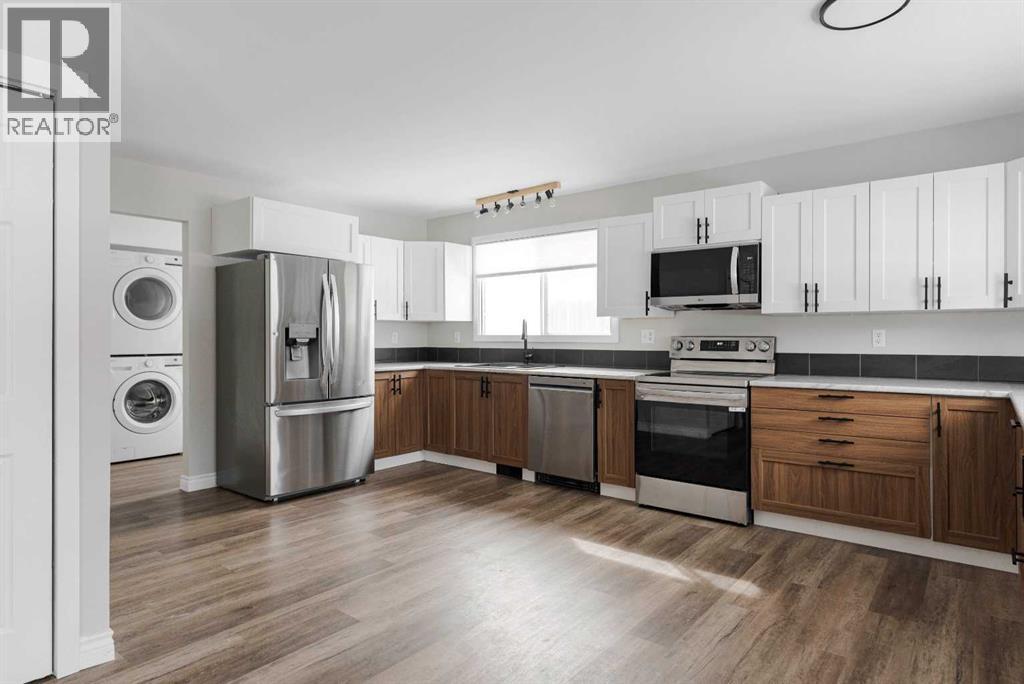 209 Woodland Drive, Fort Mcmurray, Alberta  T9K 1A4 - Photo 3 - A2296839