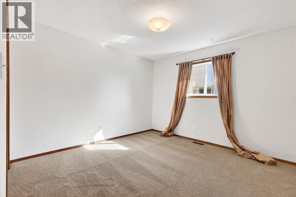 31 Sunset Crescent, Okotoks, Alberta  T1S 1P3 - Photo 14 - A2296617