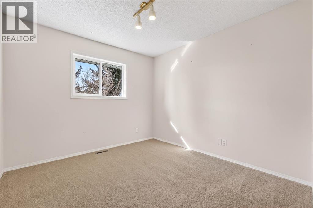 31 Sunset Crescent, Okotoks, Alberta  T1S 1P3 - Photo 12 - A2296617