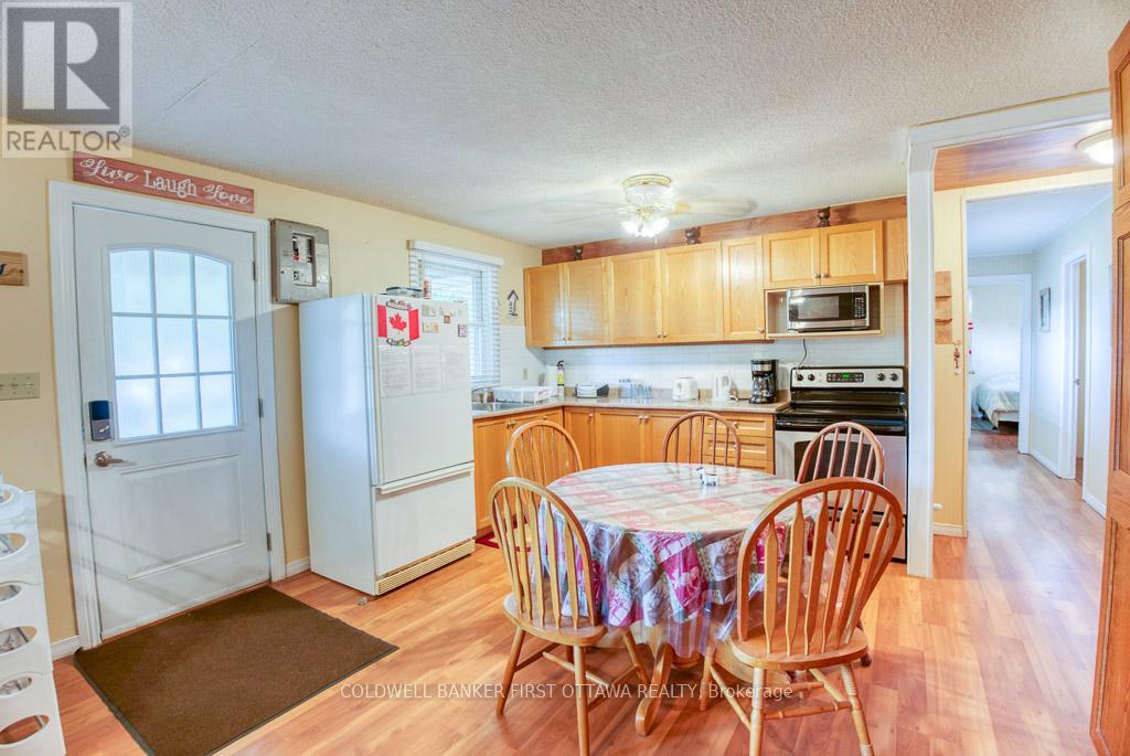 1036 Rossland Lane, Frontenac (Frontenac Centre), Ontario  K0H 1B0 - Photo 11 - X12928634