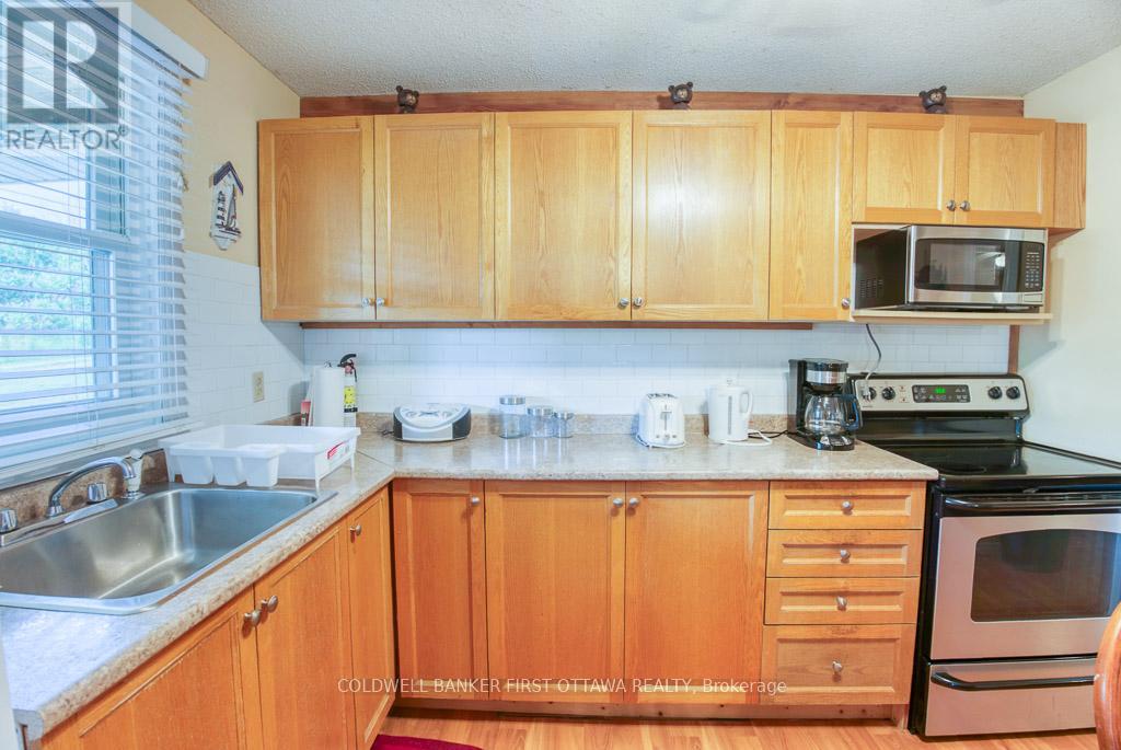 1036 Rossland Lane, Frontenac (Frontenac Centre), Ontario  K0H 1B0 - Photo 13 - X12928634