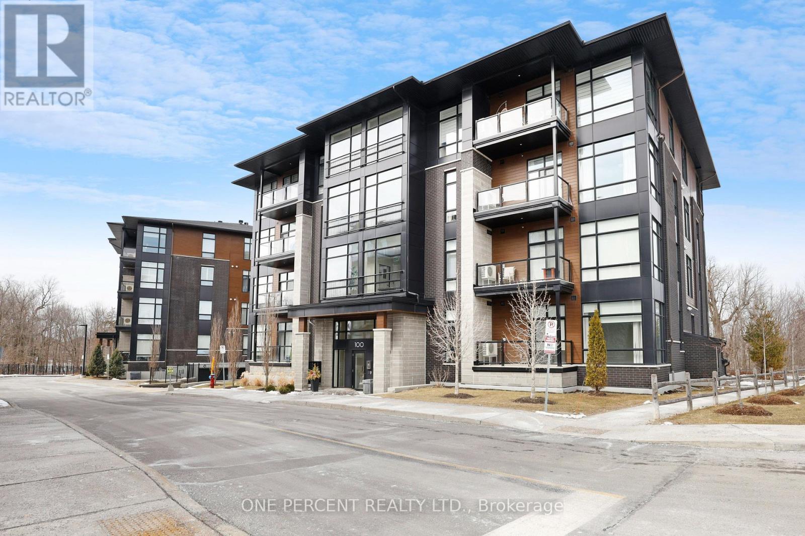 Positioned on the TOP FLOOR, this exceptional 1,445 square feet residence showcases soaring 10 feet CEILINGS and offers a refined blend of space, elegance, and abundant natural light. Meticulously maintained and beautifully upgraded, this condo presents impeccably throughout. A welcoming foyer sets the tone with a large coat closet and a dedicated laundry room, adding both convenience and functionality. High-end upgrades continue throughout the home, including upgraded flooring, tile work, and custom closet systems that enhance both style and organization. The expansive open-concept design seamlessly connects the kitchen, living, and dining areas. The designer kitchen is a true focal point, featuring a striking waterfall quartz island and upgraded stainless steel appliances, combining luxury with functionality. Floor-to-ceiling windows bathe the space in sunlight, while patio doors lead to your private balcony overlooking lush, tree-filled surroundings. This well-appointed unit offers two generous bedrooms and two full bathrooms. The primary suite is a private retreat, complete with a spacious walk-in closet outfitted with a premium custom closet system and a beautifully finished four-piece ensuite. The second bedroom is equally impressive-perfect for kids, guests or a home office. Additional features include one owned underground parking space, one exclusive-use outdoor parking space, ample visitor parking, and two private storage lockers, including one conveniently located directly behind your underground parking space and on the 4th Floor. Situated just 1.1 km from the newly opened Limebank LRT Station, this location offers effortless access to transit while maintaining a peaceful, upscale residential feel. A rare offering-this is luxury condo living at its finest, combining space, sophistication, and a setting that truly stands out. Don't forget to checkout the 3D TOUR and FLOOR PLAN. Call your Realtor to book a showing today! (id:48254)