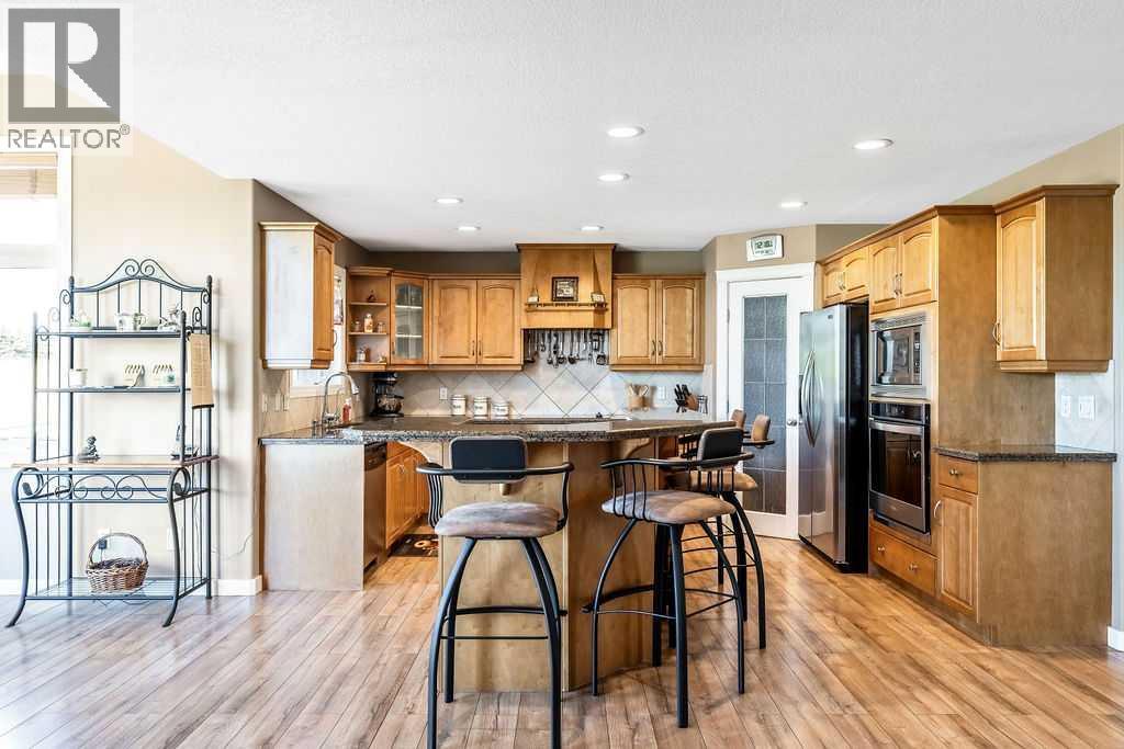 51 Norris Coulee Trail, De Winton, Alberta  T1S 5A5 - Photo 13 - A2267806