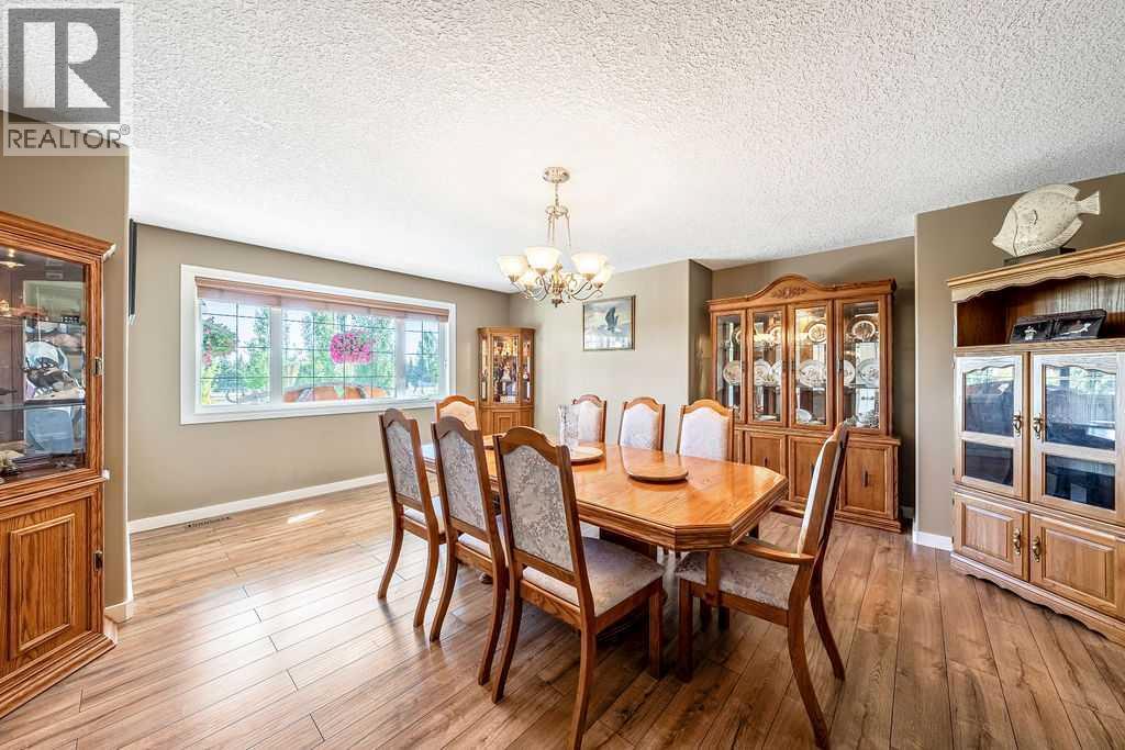 51 Norris Coulee Trail, De Winton, Alberta  T1S 5A5 - Photo 9 - A2267806