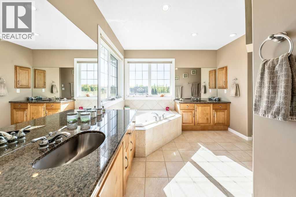 51 Norris Coulee Trail, De Winton, Alberta  T1S 5A5 - Photo 28 - A2267806