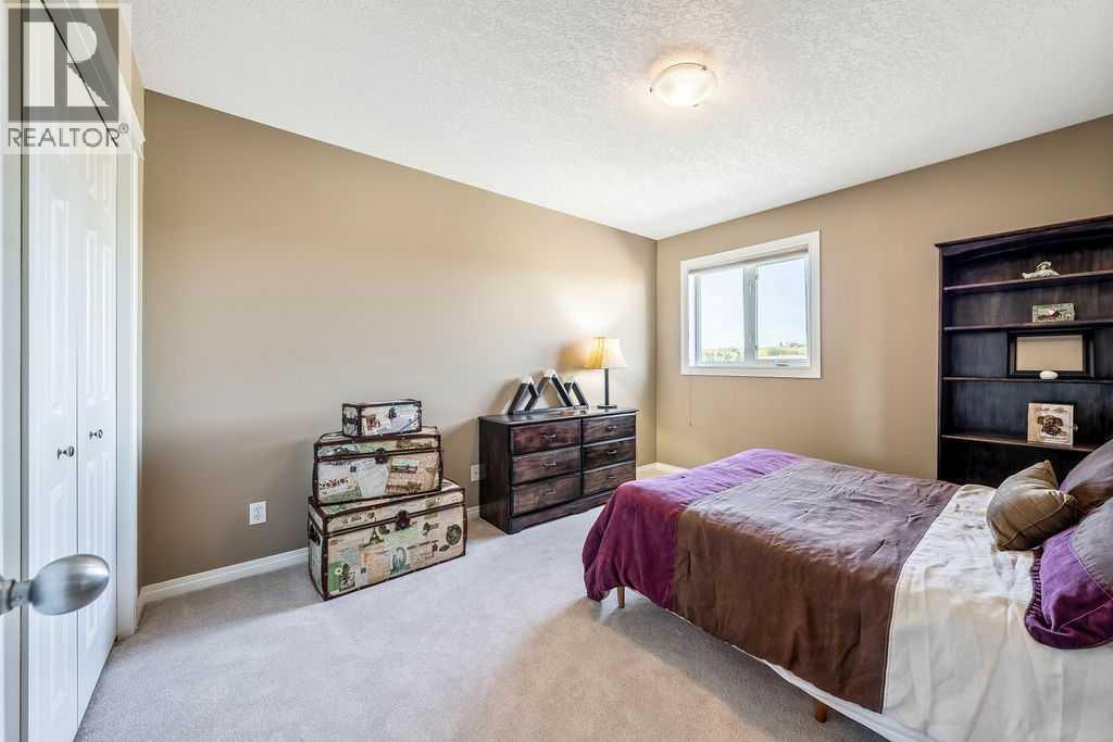 51 Norris Coulee Trail, De Winton, Alberta  T1S 5A5 - Photo 32 - A2267806