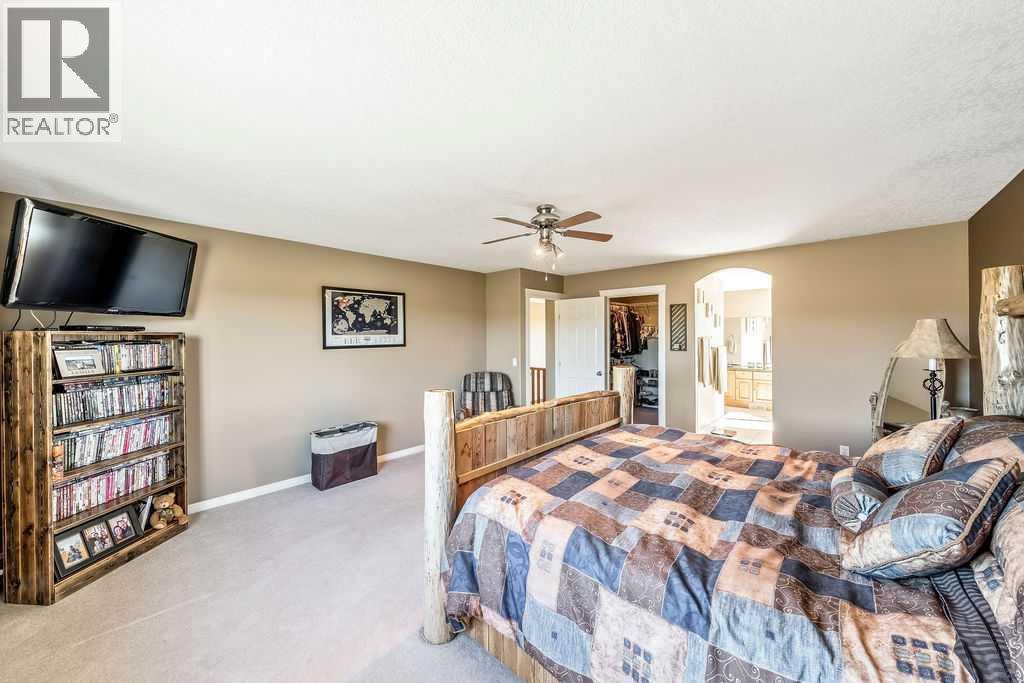 51 Norris Coulee Trail, De Winton, Alberta  T1S 5A5 - Photo 26 - A2267806