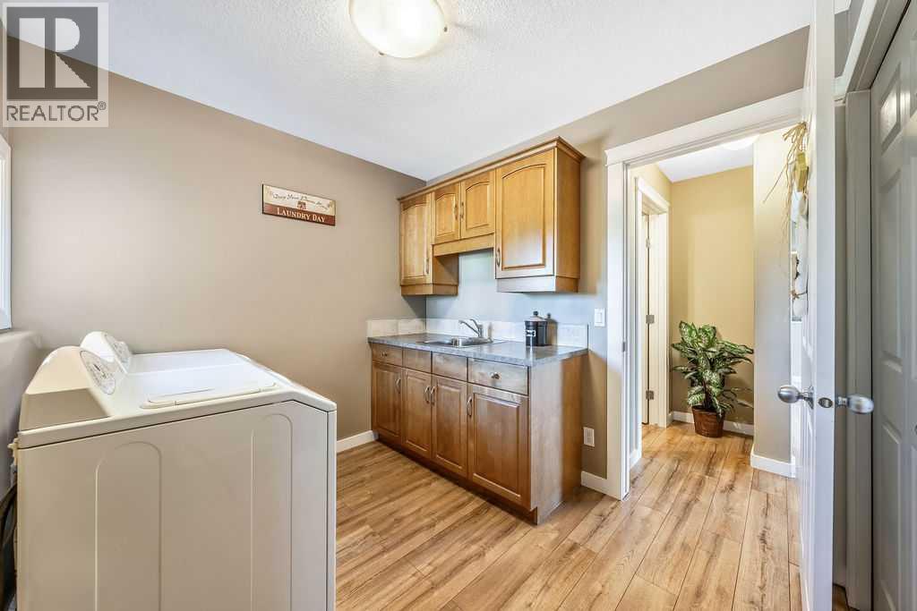 51 Norris Coulee Trail, De Winton, Alberta  T1S 5A5 - Photo 23 - A2267806