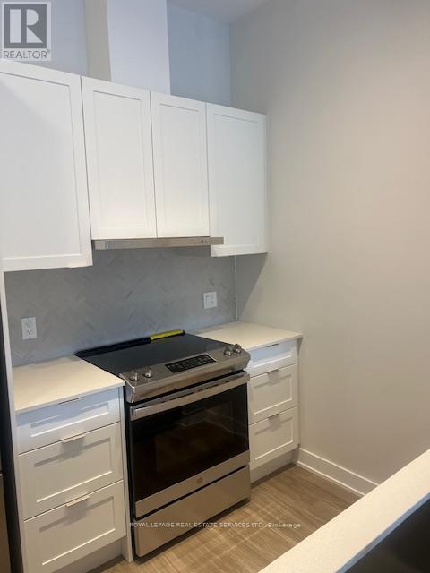 515 - 430 Square One Drive, Mississauga (City Centre), Ontario  L5B 0L6 - Photo 8 - W12928850