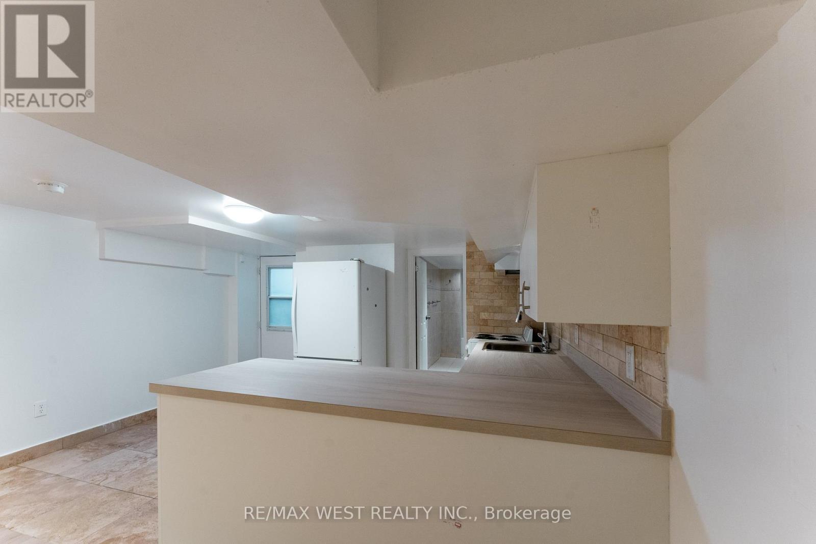 # Bsmt Ap - 12 Gillespie Avenue, Toronto, Ontario  M6N 2Y6 - Photo 7 - W12928858