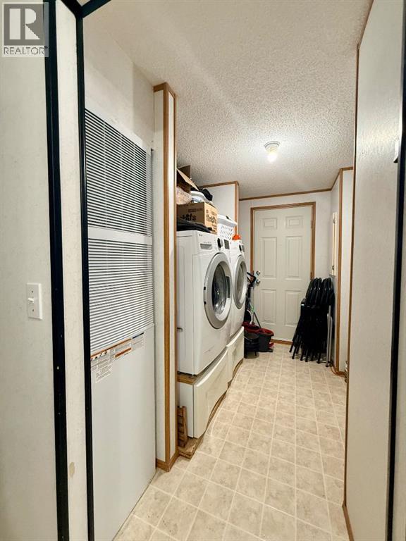 10406 Homestead Way, La Crete, Alberta  T0H 2H0 - Photo 27 - A2293997