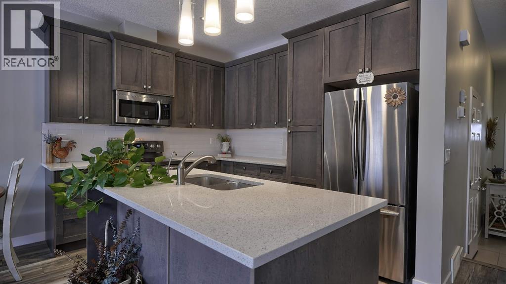 135 Reunion Loop Nw, Airdrie, Alberta  T4B 4J6 - Photo 9 - A2291091