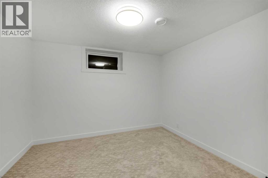 6316 Travois Crescent Nw, Calgary, Alberta  T2K 3S7 - Photo 35 - A2284391